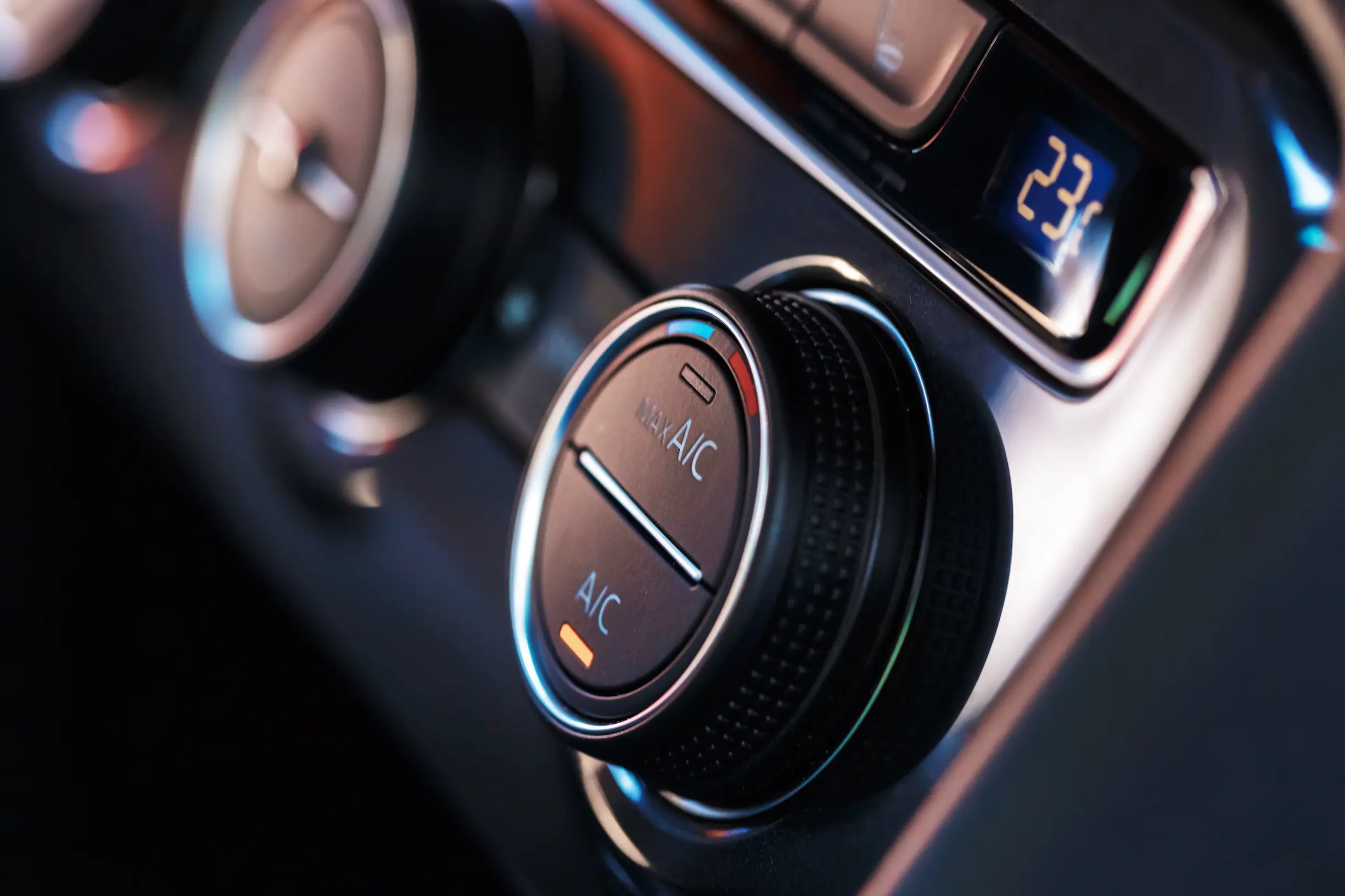 Controles de aire acondicionado y climatización de un coche